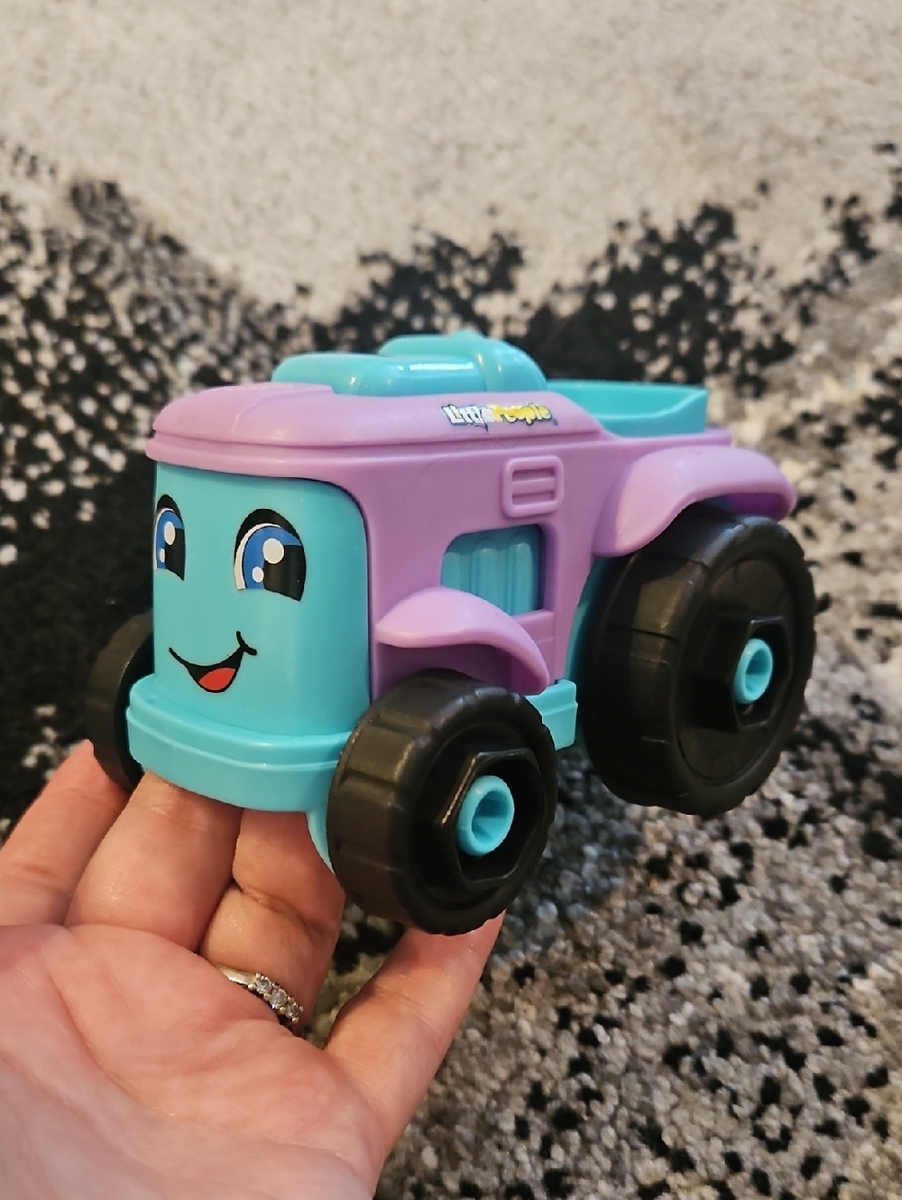 Fisher-Price Little People Barbie Toy tractor featuring a purple and teal color